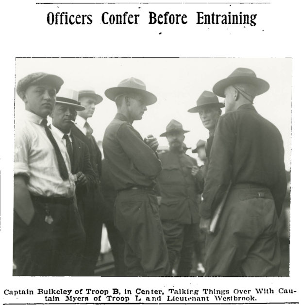 Officers Confer Before Entraining