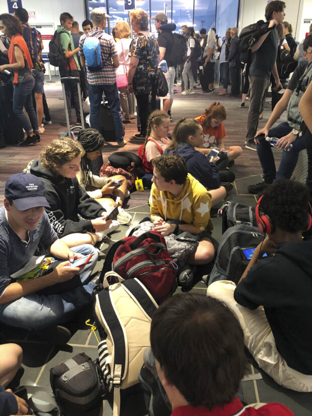 Waiting to board our flight at Logan International Airport.