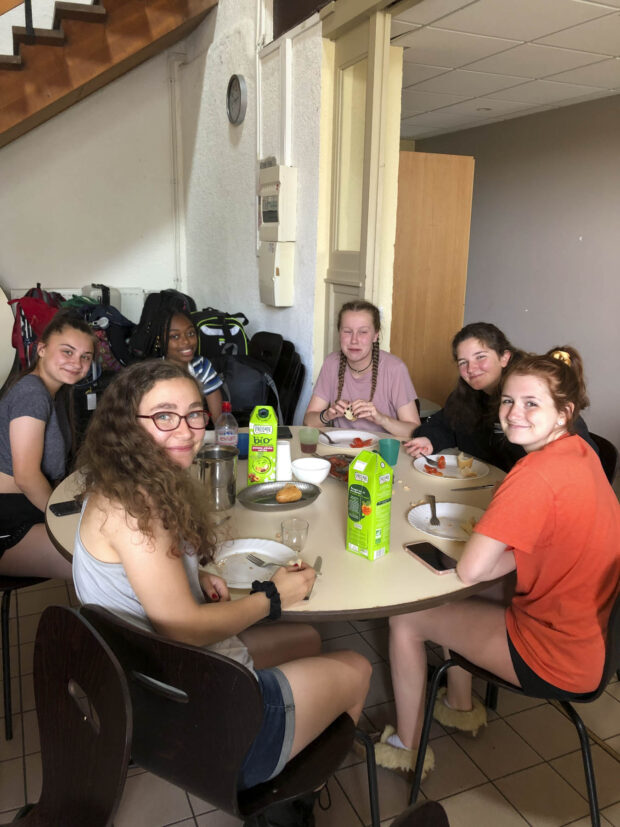 American students at a table in the Carrefour des Jeunes during our first meal in France